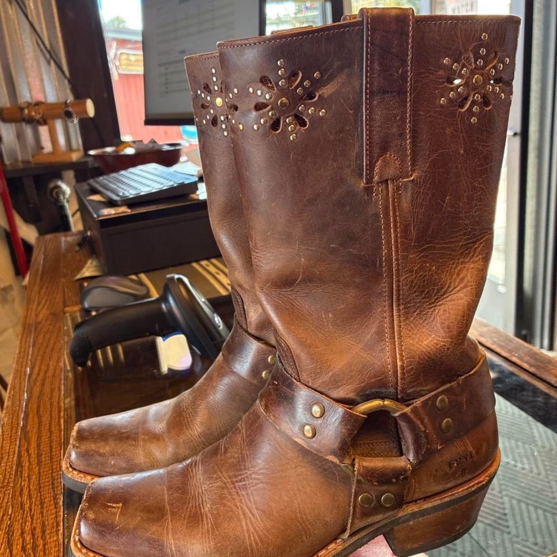Vintage Frye harness boots with floral cutouts, size 8
