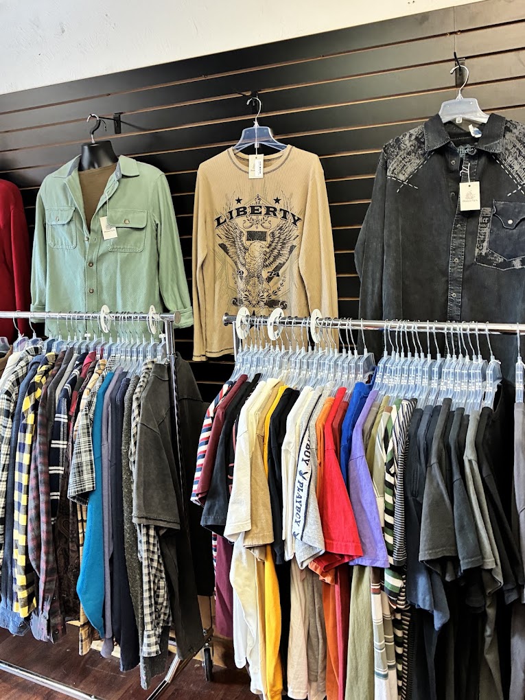 Vintage tops, flannels and band tees on the racks at Timeless Niche