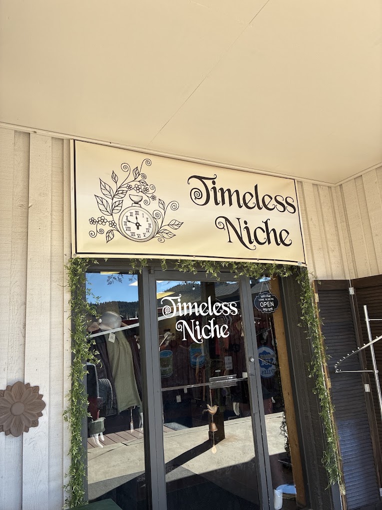 Timeless Niche hand-lettered sign above the shop entrance